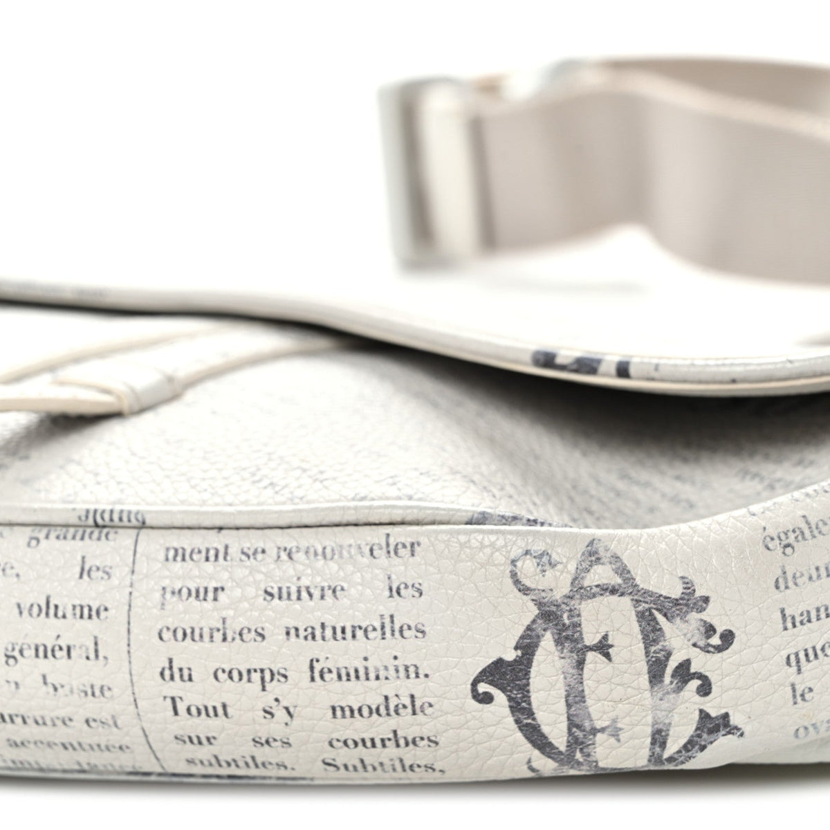 X Daniel Arsham Grained Calfskin Newspaper Print Saddle Bag White AT My store