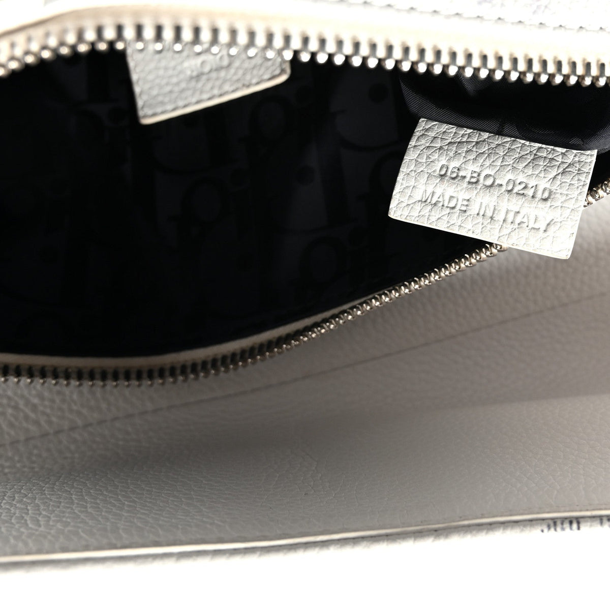 X Daniel Arsham Grained Calfskin Newspaper Print Saddle Bag White AT My store