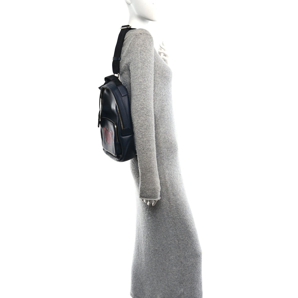 X SHAWN STUSSY Grained Calfskin Ox Head Crossbody Backpack Navy Blue AT My store